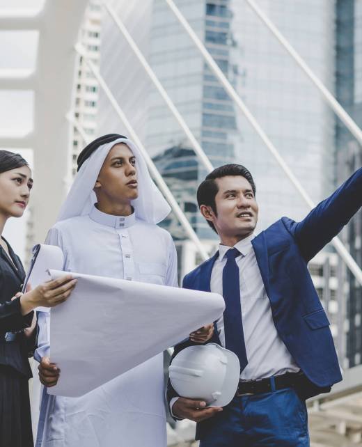 Business coworkers discussing new ideas and brainstorming together looking at new project document.